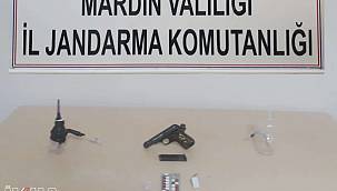 Mardin'de ruhsatsız silah ve uyuşturucu yakalandı 